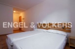 Cozy bedroom with twin beds and wooden headboard.