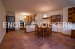 This charming apartment boasts a spacious open-plan living and dining area, perfect for entertaining.