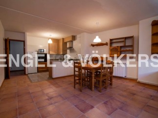 This charming apartment boasts a spacious open-plan living and dining area, perfect for entertaining.