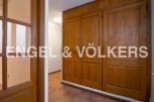 This stunning property boasts beautiful wooden built-in wardrobes, perfect for ample storage.