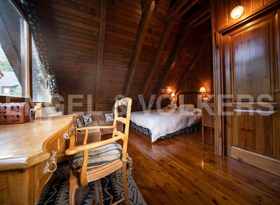 Cozy cabin retreat with a rustic wooden interior.