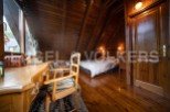 Cozy cabin retreat with a rustic wooden interior.