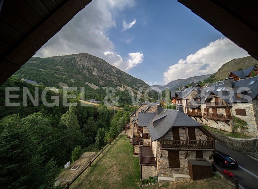 Nestled in the Spanish Pyrenees, this charming mountain home offers breathtaking valley views.
