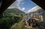 Nestled in the Spanish Pyrenees, this charming mountain home offers breathtaking valley views.