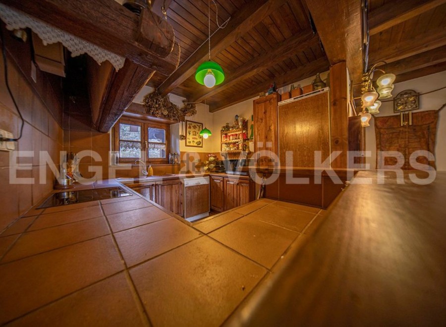 Rustic charm meets modern convenience in this unique kitchen.