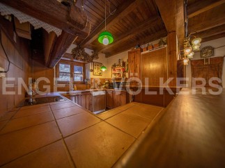 Rustic charm meets modern convenience in this unique kitchen.