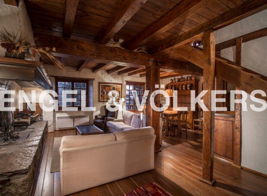 Rustic charm meets modern comfort in this stunning chalet.