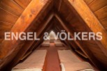 Unique attic space with multiple built-in beds, ideal for a large family or guests.