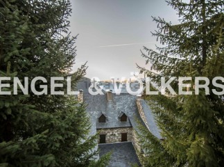 Nestled in the mountains, this charming stone house offers breathtaking views.