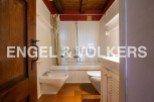 Charming bathroom with vintage details, featuring a bathtub, bidet, and toilet.