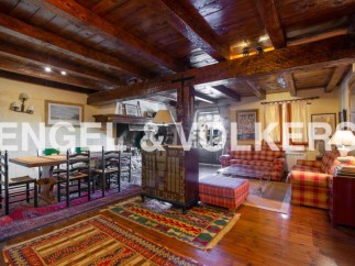Rustic charm meets modern comfort in this stunning home.