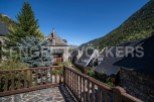 Nestled in a picturesque mountain village, this charming property offers breathtaking views and a tranquil atmosphere.