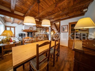 Rustic charm meets modern comfort in this stunning mountain home.