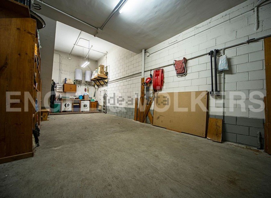 Spacious garage with ample storage.