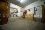 Spacious garage with ample storage.