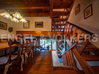 Rustic charm meets modern comfort in this unique property.