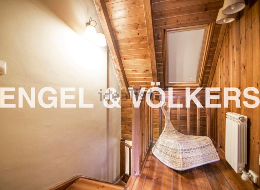 Charming wooden chalet with attic bedroom and stunning wooden interiors.