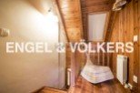 Charming wooden chalet with attic bedroom and stunning wooden interiors.