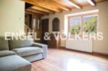 This stunning property boasts a spacious living area with large windows offering breathtaking views.