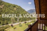 Mountain View Chalet with Balcony: Breathtaking views of the Pyrenees mountains and lush green valleys.