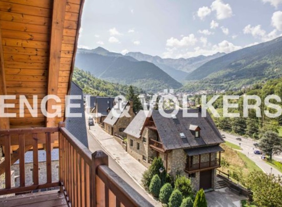 Mountain view home with balcony.