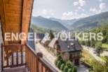 Mountain view home with balcony.