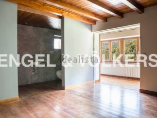 This stunning property boasts a spacious, light-filled interior with gleaming hardwood floors and high ceilings.