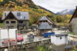 Mountainside home under construction with stunning fall foliage views.
