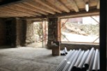 This charming property boasts exposed wooden beams and stone walls, creating a rustic and inviting atmosphere.