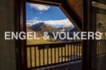 Mountain view chalet with spacious balcony.