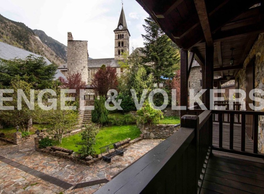 This stunning property boasts a picturesque courtyard garden, offering a tranquil escape.
