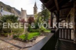 This stunning property boasts a picturesque courtyard garden, offering a tranquil escape.