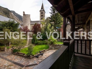 This stunning property boasts a picturesque courtyard garden, offering a tranquil escape.