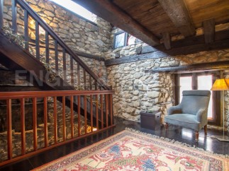 This stunning property boasts a unique blend of rustic charm and modern comfort.