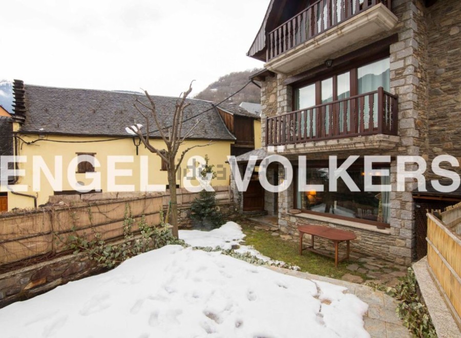Charming stone house with a private garden perfect for enjoying snowy landscapes.