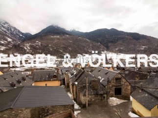 Nestled in the Pyrenees Mountains, this charming village home offers breathtaking views and a peaceful retreat.