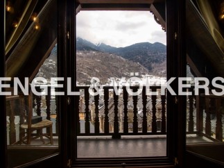 This stunning property boasts breathtaking mountain views from its private balcony.