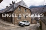 Charming stone house nestled in the mountains, offering stunning views.
