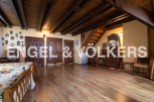 This stunning property boasts a spacious bedroom with antique wooden furniture and a beautiful wooden floor.