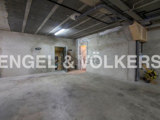 Spacious parking space with ample room for maneuvering.