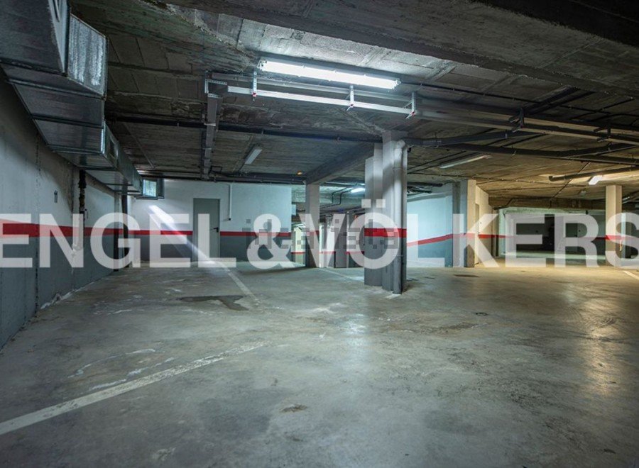 Spacious underground parking with ample room for vehicles.