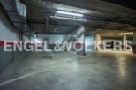 Spacious underground parking with ample room for vehicles.