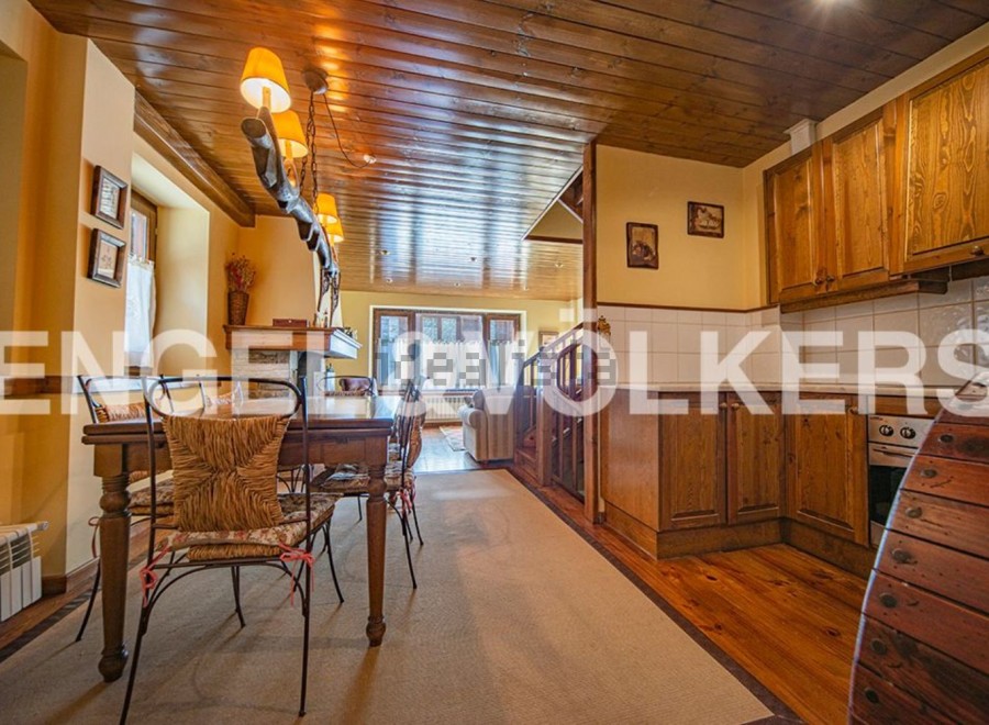 Rustic charm meets modern comfort in this stunning property.