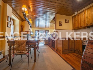 Rustic charm meets modern comfort in this stunning property.