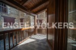 This stunning property boasts a unique balcony overlooking a charming courtyard, offering breathtaking views and ample natural light.