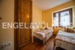 Charming bedroom with two twin beds, perfect for guests or children.