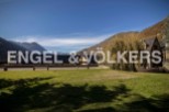 Mountain view property with large green space.