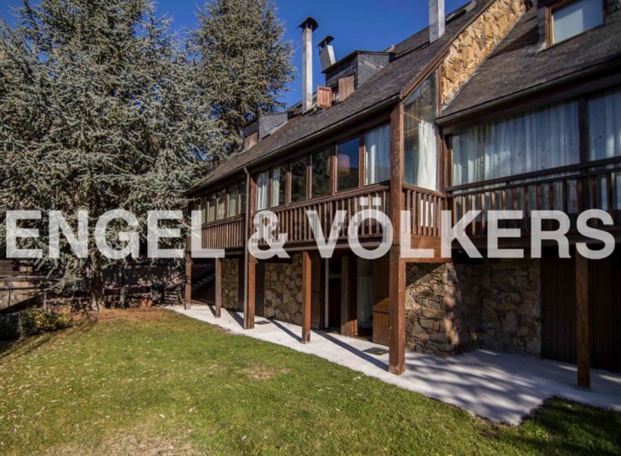 Mountain retreat with stunning views and spacious balconies.