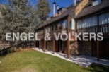 Mountain retreat with stunning views and spacious balconies.