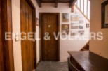 Charming wooden doors and floors create a cozy atmosphere in this unique property.